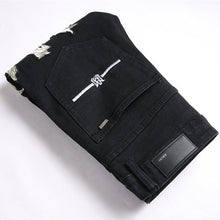 Amiri Jeans Ripped Stretch Jeans