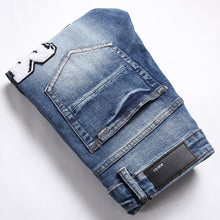 Amiri Jeans Ripped Stretch Jeans